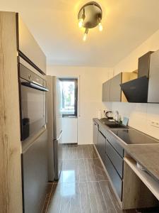 Η κουζίνα ή μικρή κουζίνα στο Schöne Maisonette im Villa 12-5 Uni Mainz