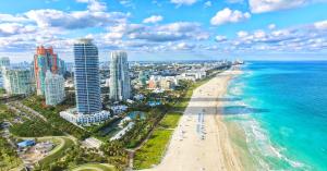 an aerial view of a beach and the ocean at Oceanfront Private Condo at The Setai -2707 in Miami Beach