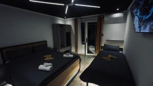 Ліжко або ліжка в номері Hotel Davids