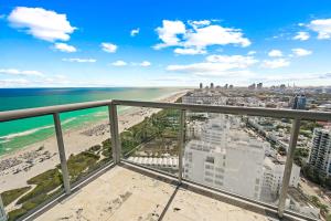 a view of the beach from the balcony of a condo at Oceanview Private Condo at The Setai -3504 in Miami Beach