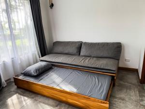 A bed or beds in a room at The Bohemian Lagarto