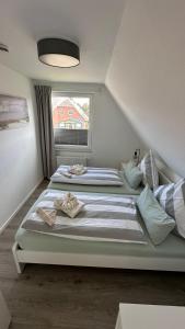 Foto dalla galleria di Dünenhus Borkum - Apartment Dünenrose a Borkum Altre 7 foto