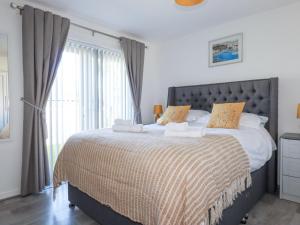 Voodi või voodid majutusasutuse Palm View toas