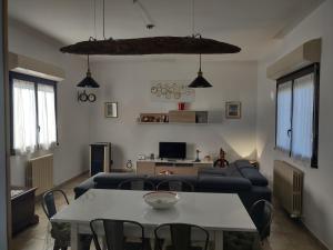 a living room with a couch and a table at Agli Ulivi in Filo
