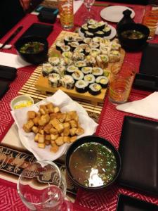 a table topped with plates of food and bowls of food at HOMESTAY Yas & Jay in Lima