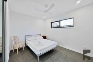 Postel nebo postele na pokoji v ubytování 9 Basalt Court, Bargara