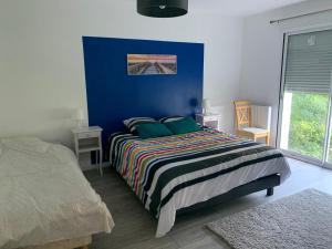 Postel nebo postele na pokoji v ubytování Escapade Marine chambre d hotes