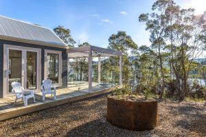 a house with a view of the ocean at The BoatHouse in Dover +19 photos