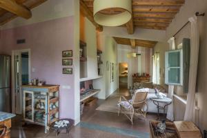 a living room with a couch and a table at Settignano Tuscany Homes in Settignano