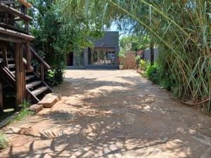 a driveway with a house in the background at Urban Villa 25 in Gaborone