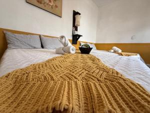 Un ou plusieurs lits dans un hébergement de l'établissement Casa del viajero Antigua
