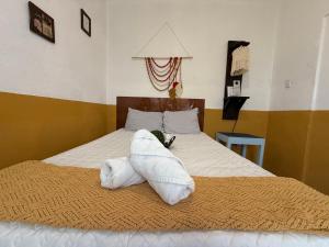 Un ou plusieurs lits dans un hébergement de l'établissement Casa del viajero Antigua