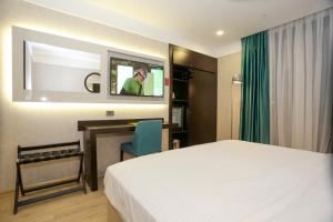 Postel nebo postele na pokoji v ubytování Milord Hotel