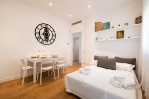 A bed or beds in a room at Casa Meltemi