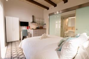 Llit o llits en una habitació de 15 Main Gate