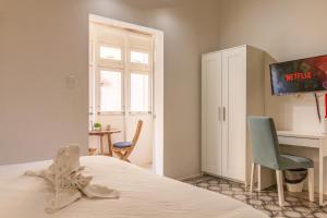 Llit o llits en una habitació de 15 Main Gate