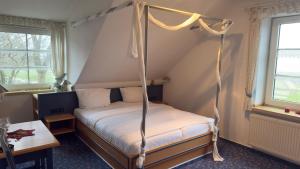 Ένα ή περισσότερα κρεβάτια σε δωμάτιο στο Hotel Up´n Diek +28 φωτογραφίες