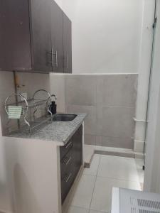 Kuchyň nebo kuchyňský kout v ubytování Hospedaje Bustamante 3155 + 58 fotografií