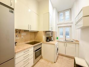 Køkken eller tekøkken på Home Sonhos Fanqueiros