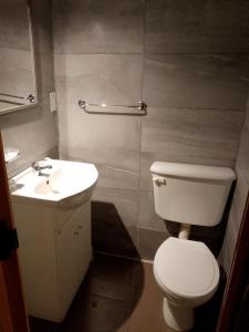 Koupelna v ubytování Habitación en apto compartido para una persona