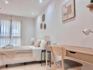 Ένα ή περισσότερα κρεβάτια σε δωμάτιο στο Apartamento Mare Nostrum