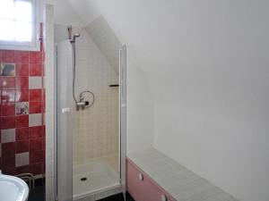 a bathroom with a shower and a sink at Holiday Home in Trébeurden with Sea View in Trébeurden +10 photos