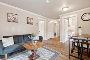 a living room with a couch and a table at Judkins Entire Upper Floor - Close to Downtown in Seattle