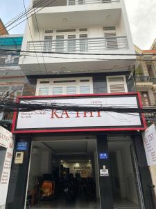 a karmaarma restaurant with a sign in front of a building at Kathy Hotel in Ho Chi Minh City +19 photos