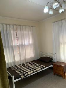 Uma cama ou camas num quarto em Nadi Airport rooms
