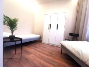 Katil atau katil-katil dalam bilik di Go Residence 4, appartamento in centro città +1 gambar
