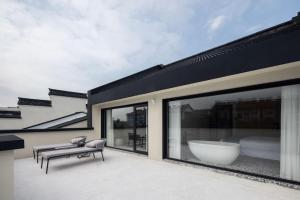 Patio nebo venkovní prostory v ubytování 乌镇乌外坞酒店
