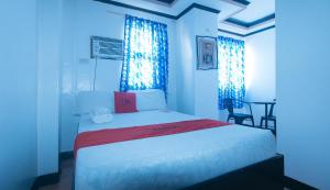 Voodi või voodid majutusasutuse RedDoorz at Minas Place 1 Tacloban toas