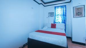 Voodi või voodid majutusasutuse RedDoorz at Minas Place 1 Tacloban toas