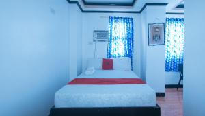 Voodi või voodid majutusasutuse RedDoorz at Minas Place 1 Tacloban toas