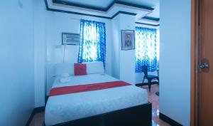 Voodi või voodid majutusasutuse RedDoorz at Minas Place 1 Tacloban toas