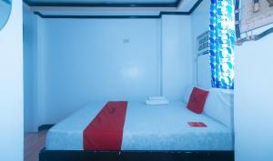 Voodi või voodid majutusasutuse RedDoorz at Minas Place 1 Tacloban toas