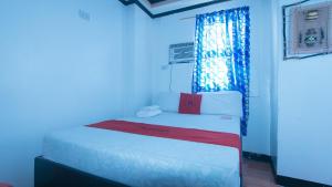 Voodi või voodid majutusasutuse RedDoorz at Minas Place 1 Tacloban toas