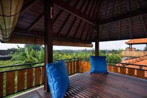 Balkón nebo terasa v ubytování Oemah Joglo 2 Ubud