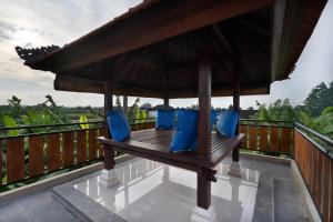 Balkón nebo terasa v ubytování Oemah Joglo 2 Ubud