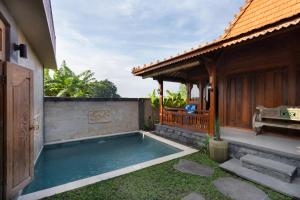 Bazén v ubytování Oemah Joglo 2 Ubud nebo v jeho okolí