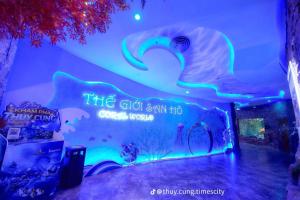 a room with a wall with a painting of an elephant at KABILUX HOUSE - 1-2-3 Bedrooms in Vinhomes Times City in Hanoi +58 photos