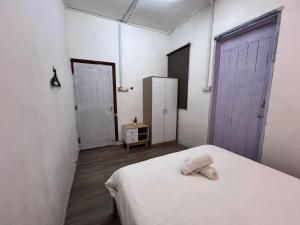 Postel nebo postele na pokoji v ubytování Mountain View Guesthouse Cameron Highlands
