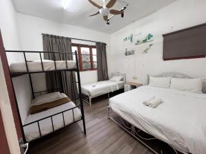 Postel nebo postele na pokoji v ubytování Mountain View Guesthouse Cameron Highlands