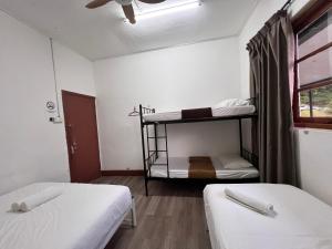 Postel nebo postele na pokoji v ubytování Mountain View Guesthouse Cameron Highlands