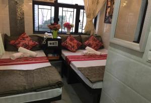 Postel nebo postele na pokoji v ubytování Skylark Hostel