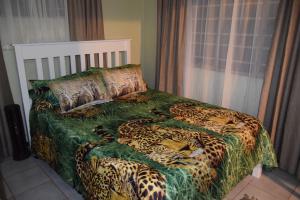 Katil atau katil-katil dalam bilik di Bushbaby Eden