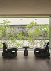 Area soggiorno di 西塘光向度艺术酒店WNDR Hotel Xitang