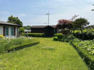 Fotografie z fotogalerie ubytování Yongin Greenish Family Cottage with a Fireside Yard v destinaci Jongin