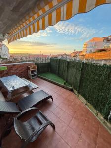 A balcony or terrace at El Pinar de Mogro atardeceres únicos