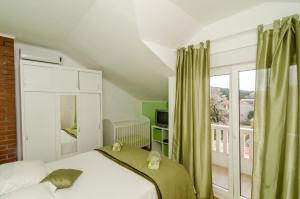 Postel nebo postele na pokoji v ubytování Holiday Home Tina + 28 fotografií